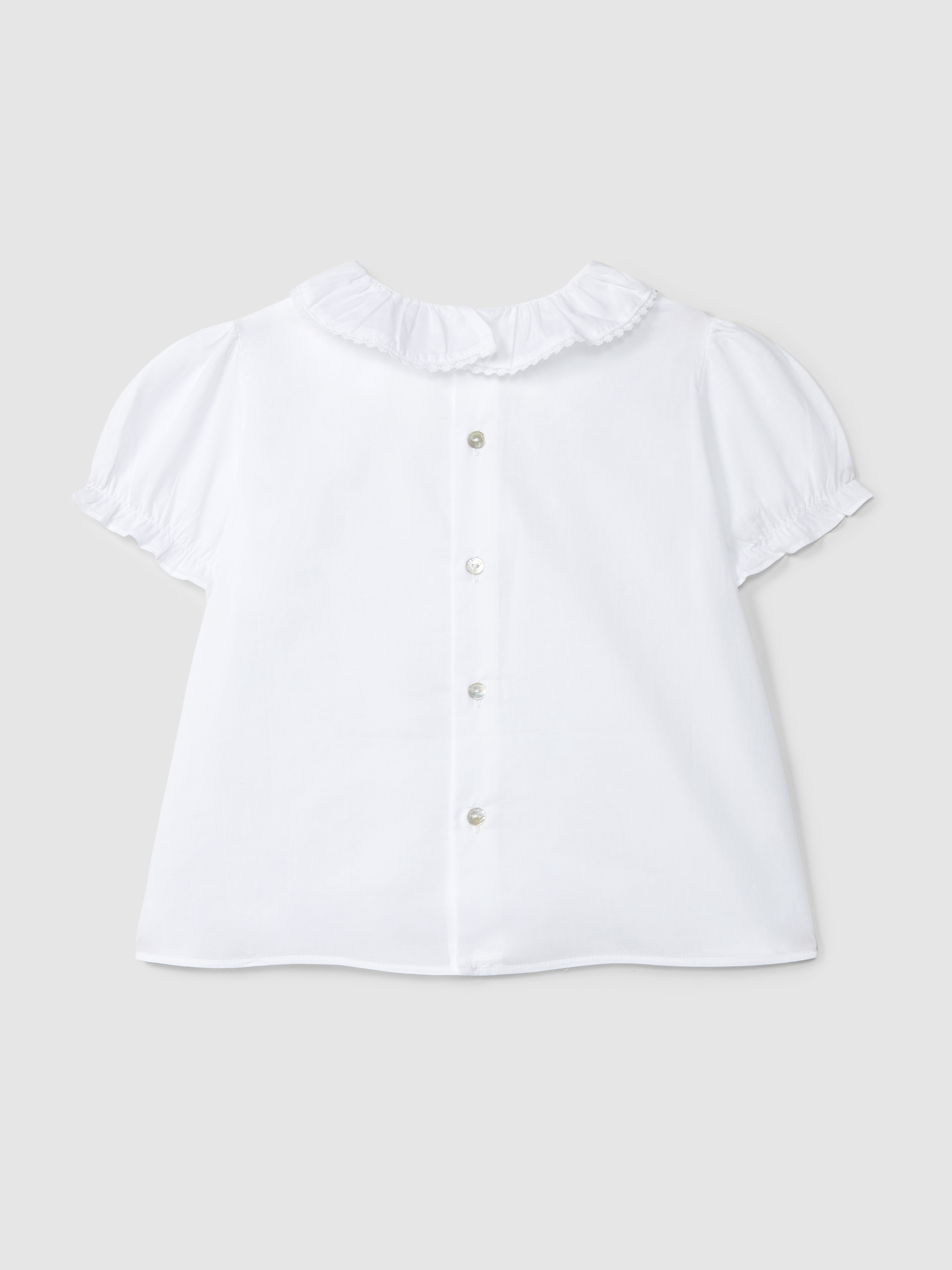 Blusa con detalles en encaje