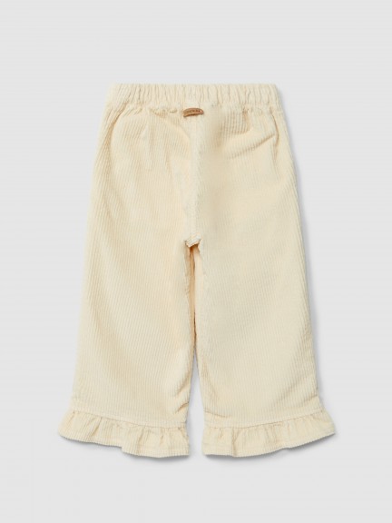 Pantalón pull-up en pana con detalle de volante Pantalón pull-up en pana con detalle de volante