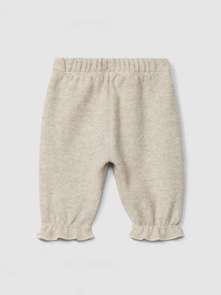 Pull-up pants with pockets and lace detail Pull-up pants with pockets and lace detail