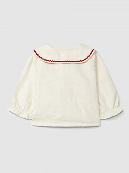 Blusa com detalhe de espiguilha em cor contraste Blusa com detalhe de espiguilha em cor contraste