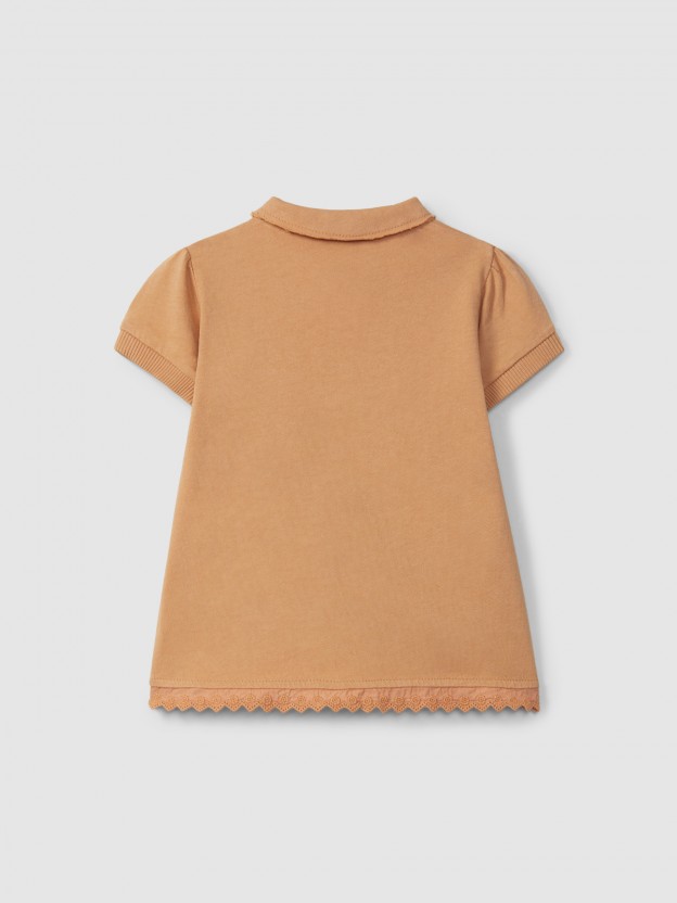 Robe en maille unie avec d�tails brod�s
