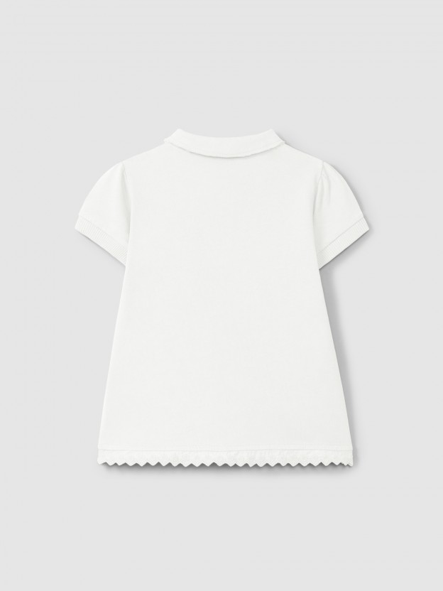 Robe en maille unie avec d�tails brod�s