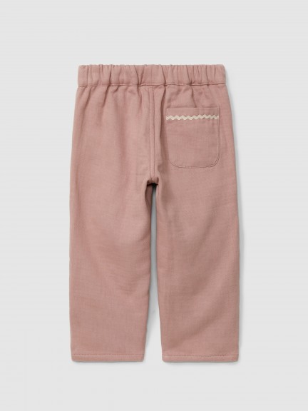 Pantalón pull-up con detalle bordado y picunela Pantalón pull-up con detalle bordado y picunela
