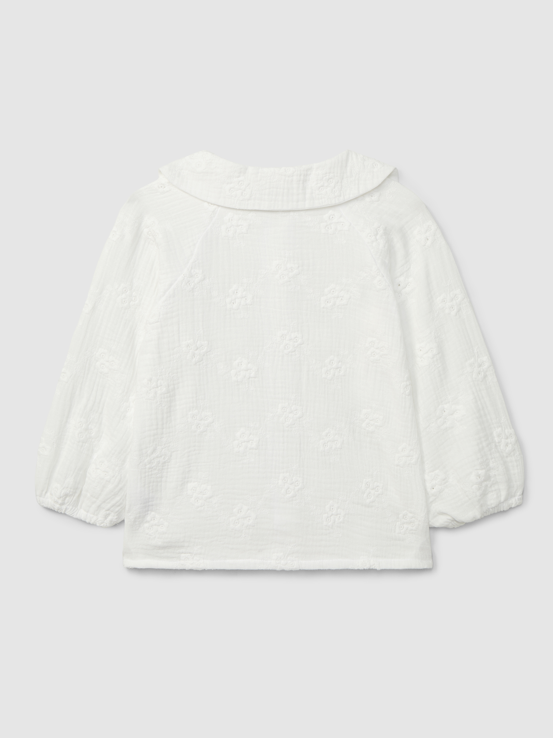 Blusa em gaze bordado floral