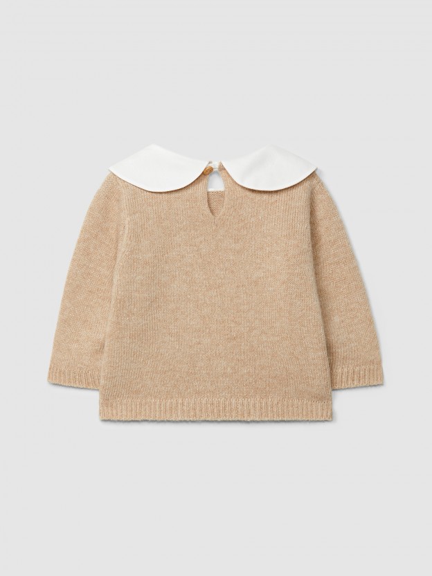 Knitted sweater with embroidered detail on the collar