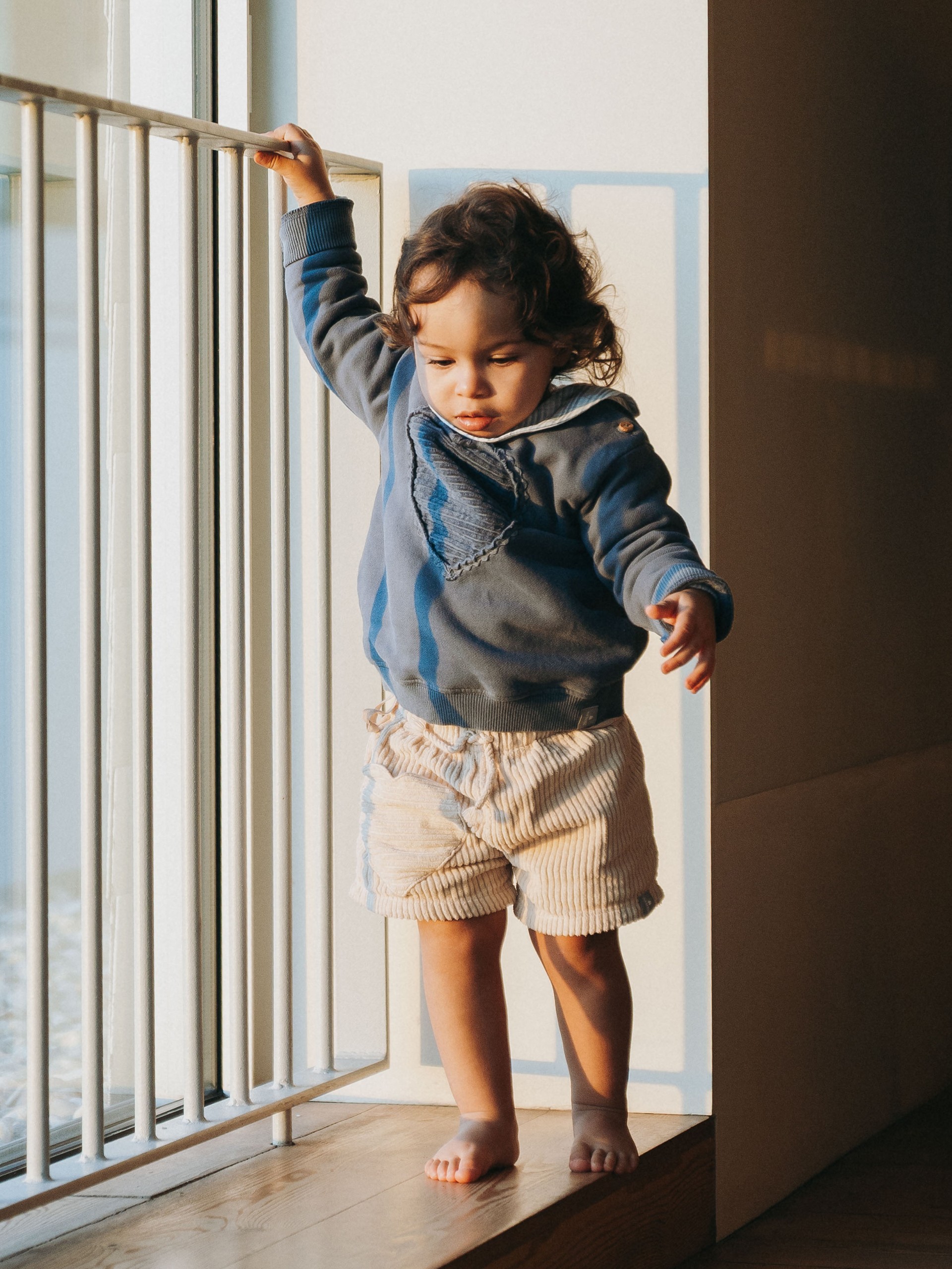 Calções pull-up em veludo canelado com bolso coração