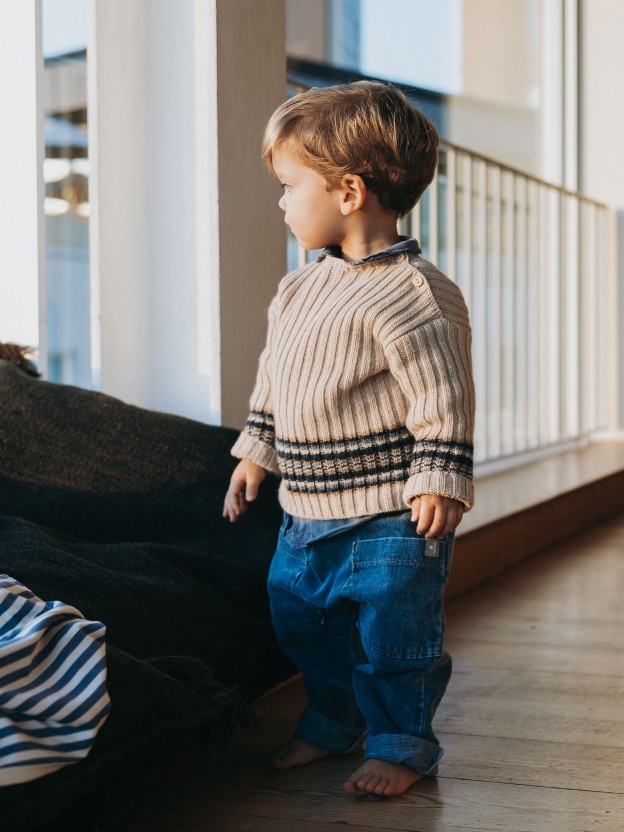 Knitted jumper with striped hem Knitted jumper with striped hem