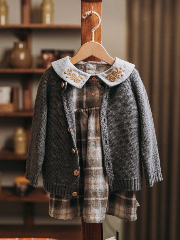 Knitted cardigan with a round neck