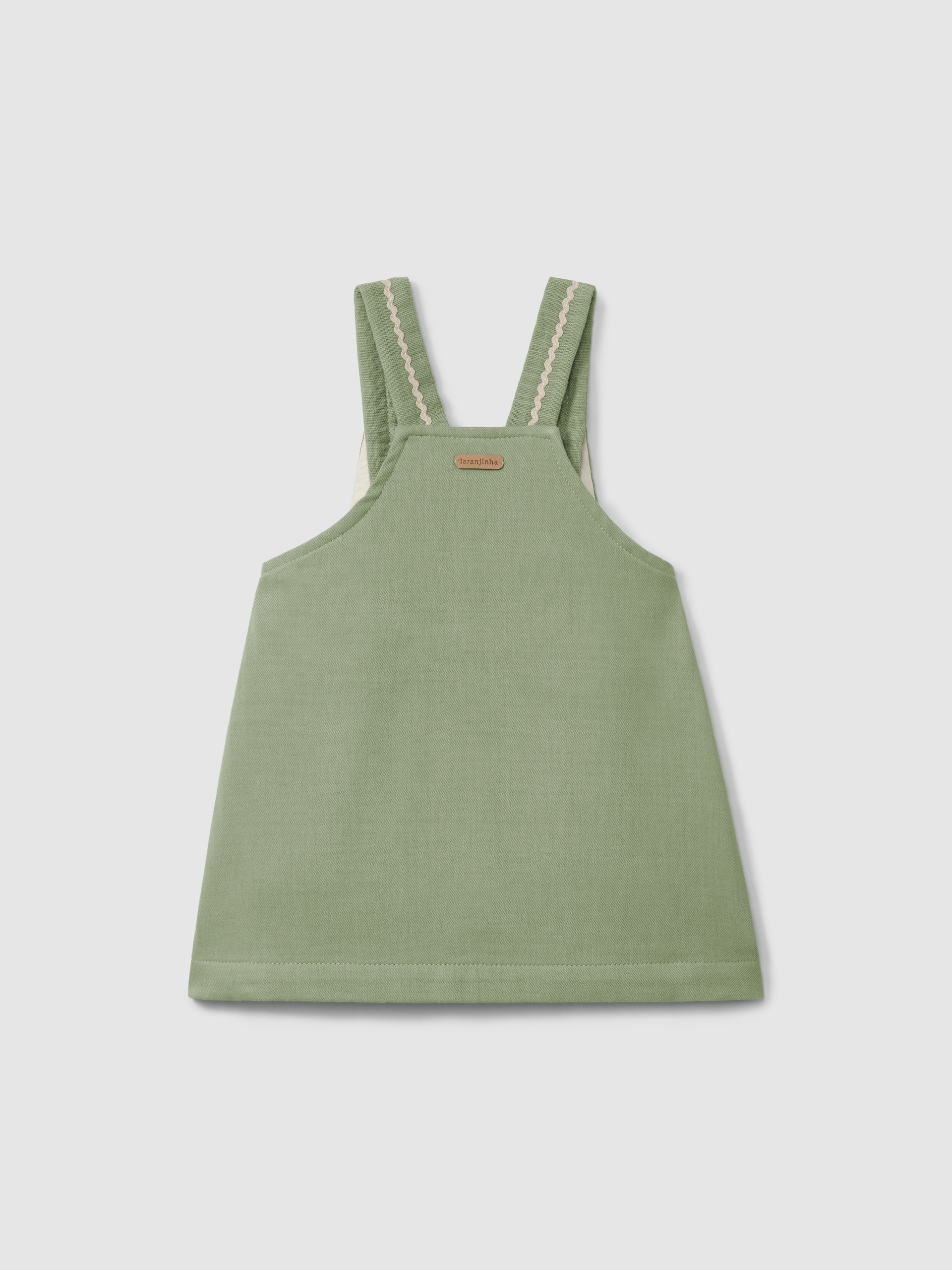Pinafore dress with embroidered detail and rickrack