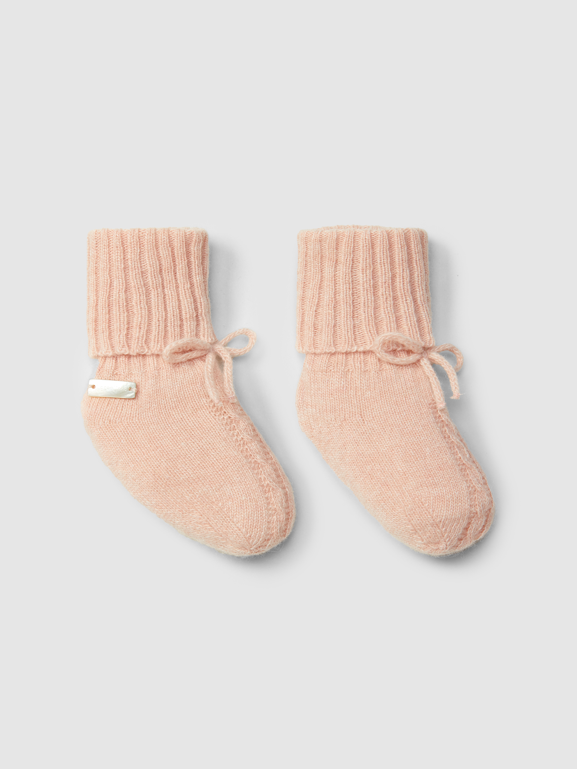 Knitted booties with cable-knit detail