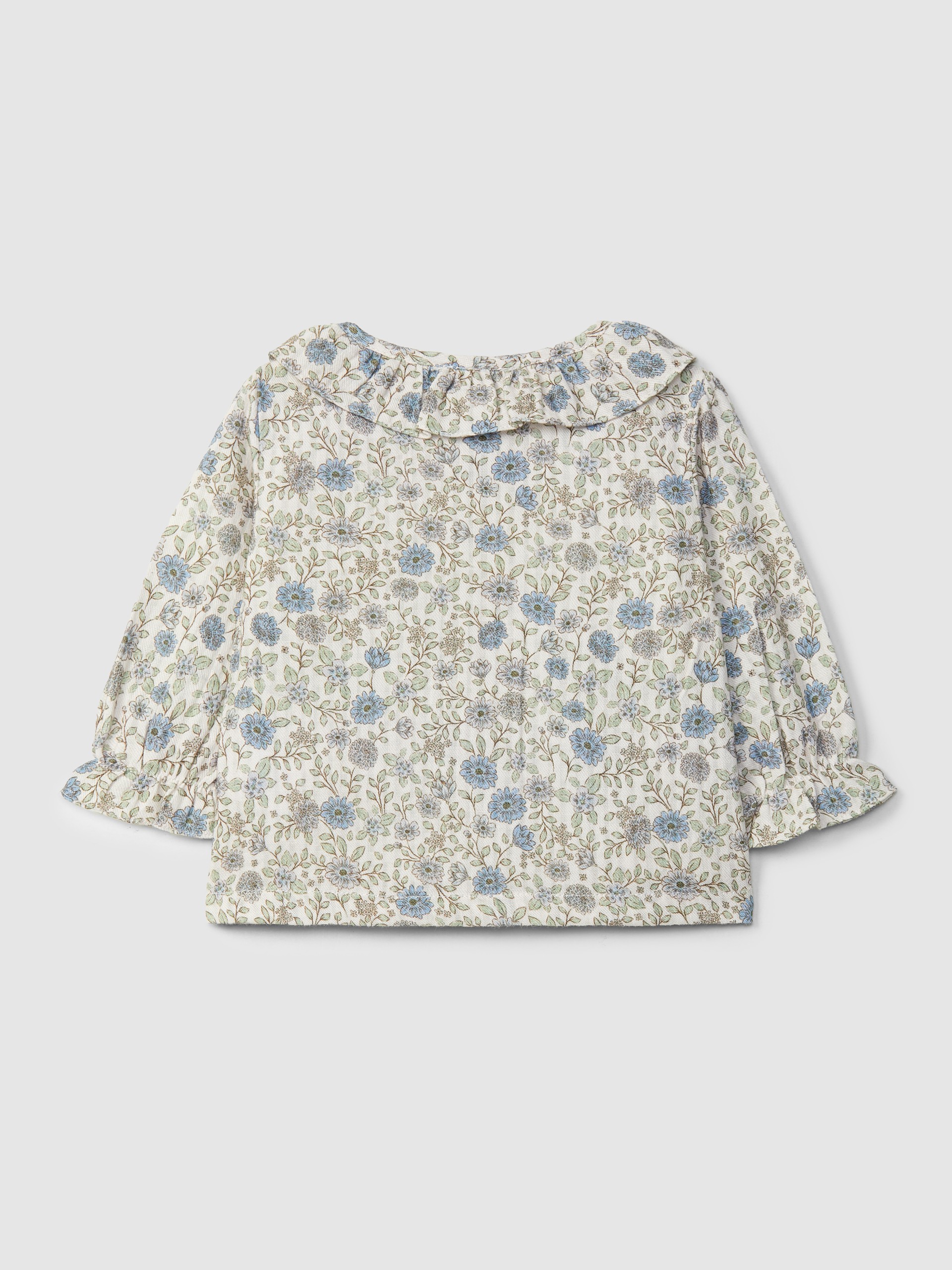 Blusa de flores con cuello de volante