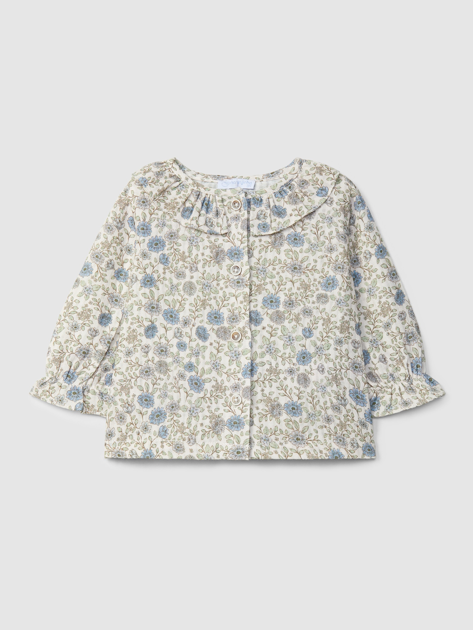 Blusa de flores con cuello de volante