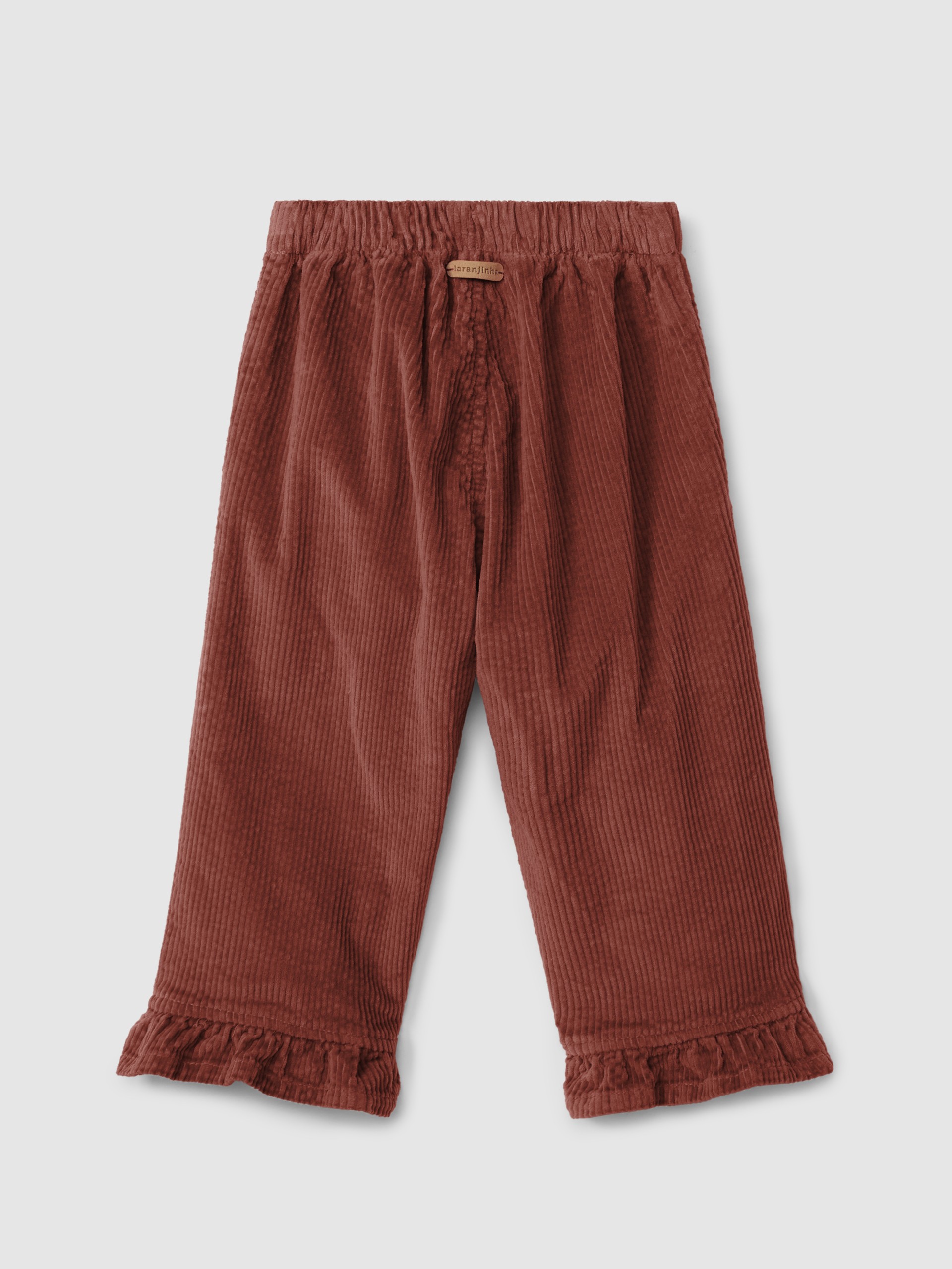 Pantalón pull-up en pana con detalle de volante