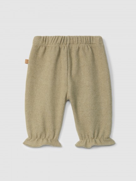 Pantalón pull-up con bolsillos y detalle de encaje Pantalón pull-up con bolsillos y detalle de encaje