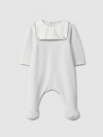 Babygrow in velvet with print fabric detail Babygrow in velvet with print fabric detail