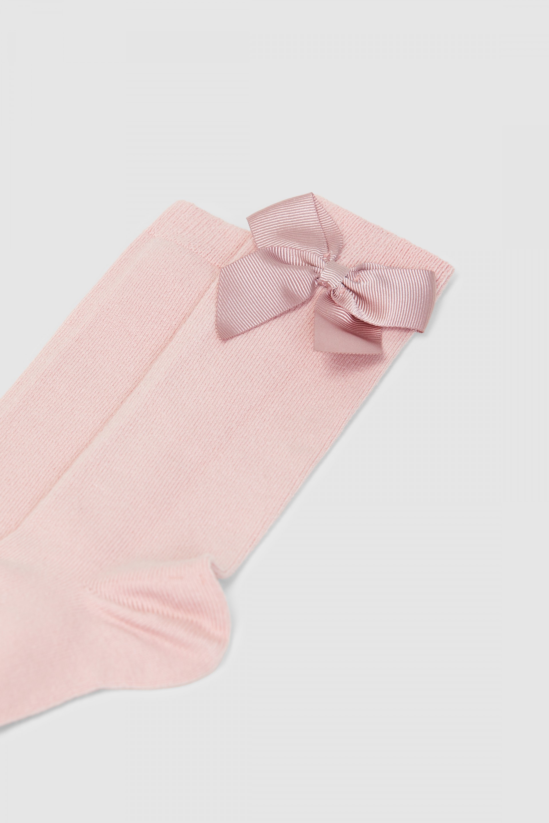 Knee-high socks with grossgrain side bow Cóndor
