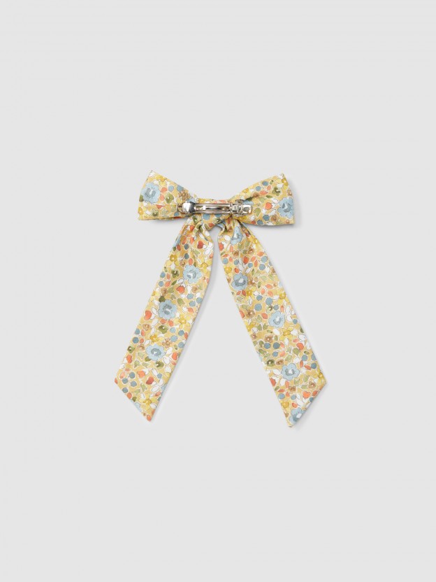 Fabric bow with large ends
