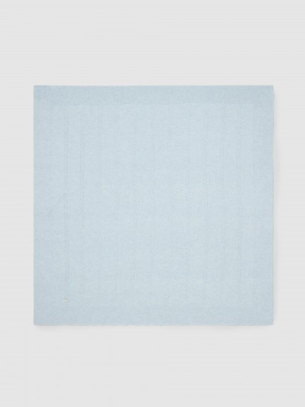 Couverture tricotée avec détail de tresse Couverture tricotée avec détail de tresse