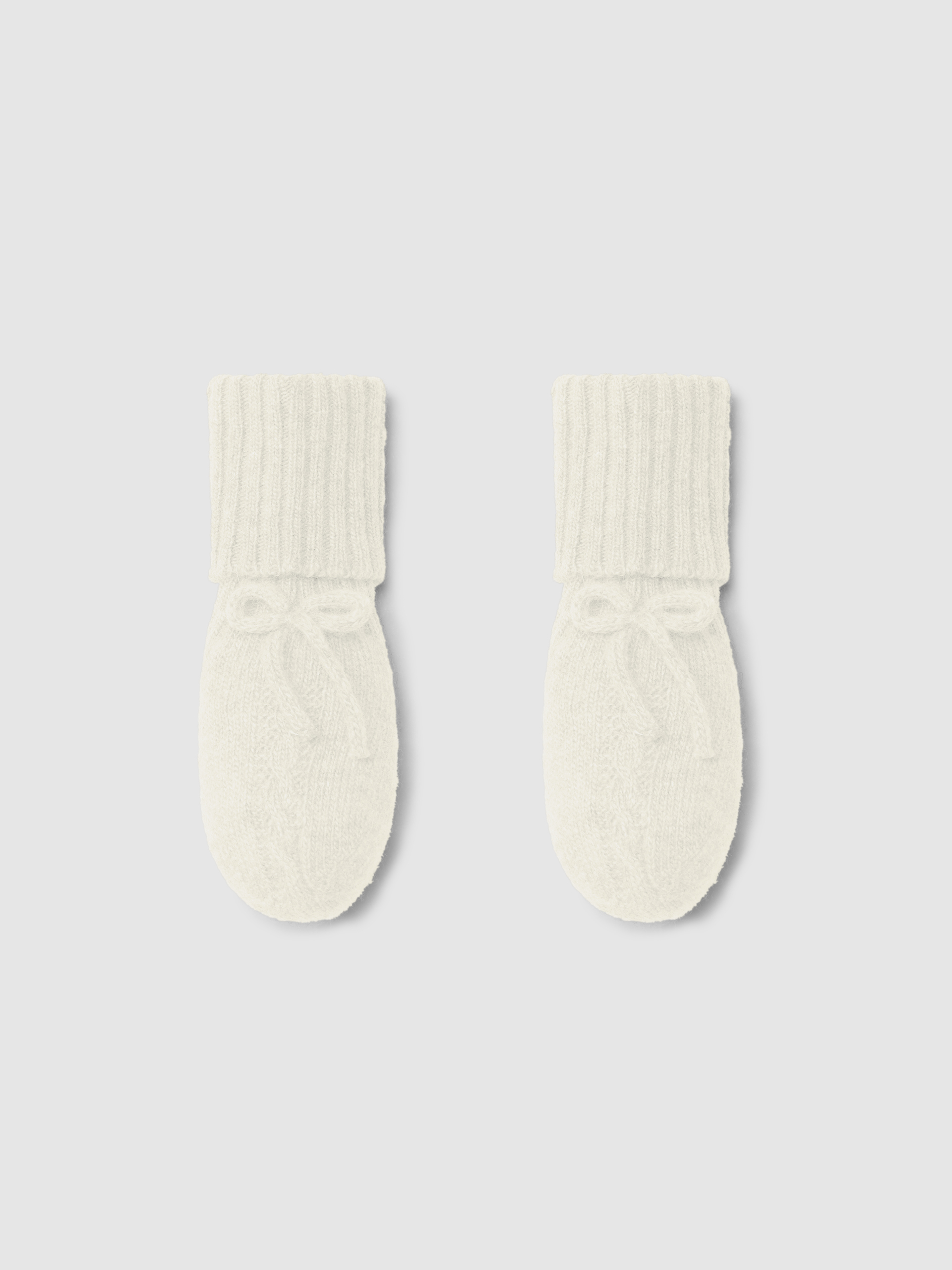 Knitted booties with cable-knit detail