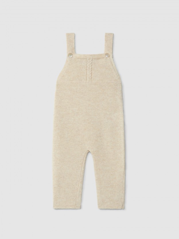 Dungarees knitted in wool with cable-knit detail Dungarees knitted in wool with cable-knit detail